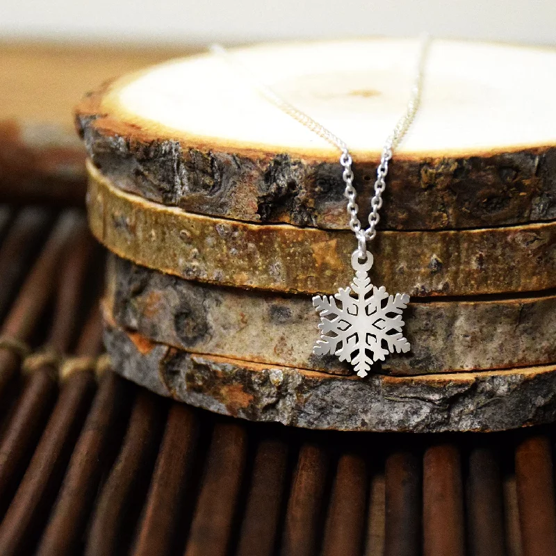 Mirror finish necklaces-Kindness Dainty Snowflake Necklace - Silver finish