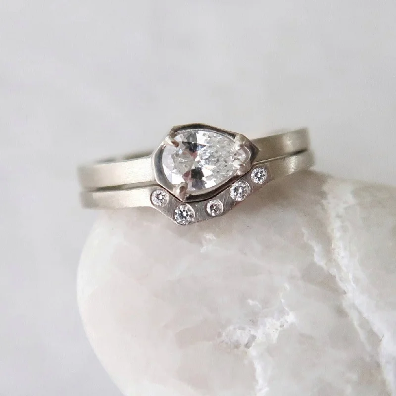 Timeless lock rings-East + West Geo Pear Ring Set