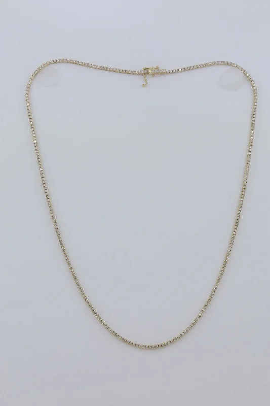 Angled bar necklaces-14 kt yellow gold, 16" 4 prong diamond tennis necklace featuring 2.25 cts tw round diamonds