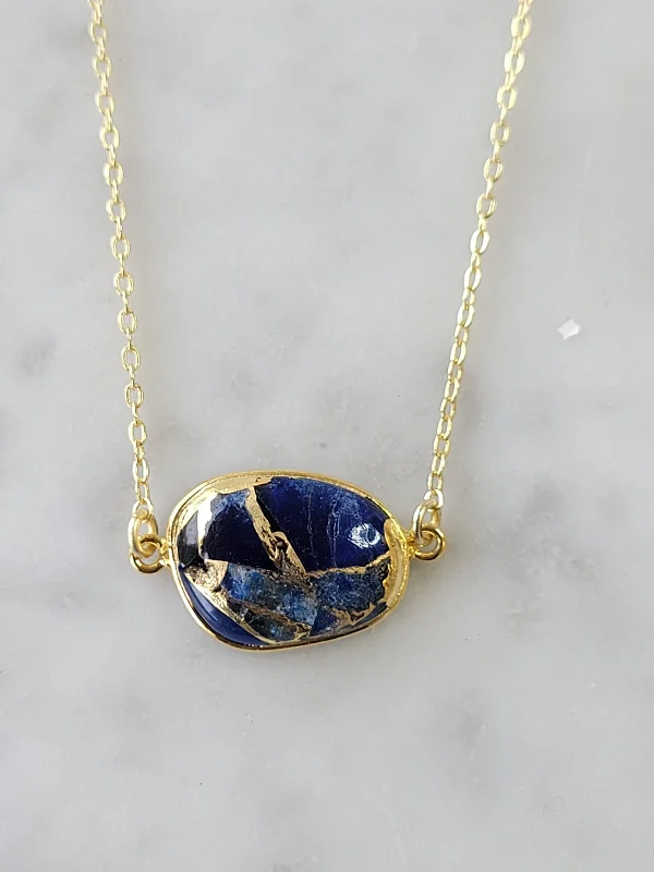 blue/gold colored brass