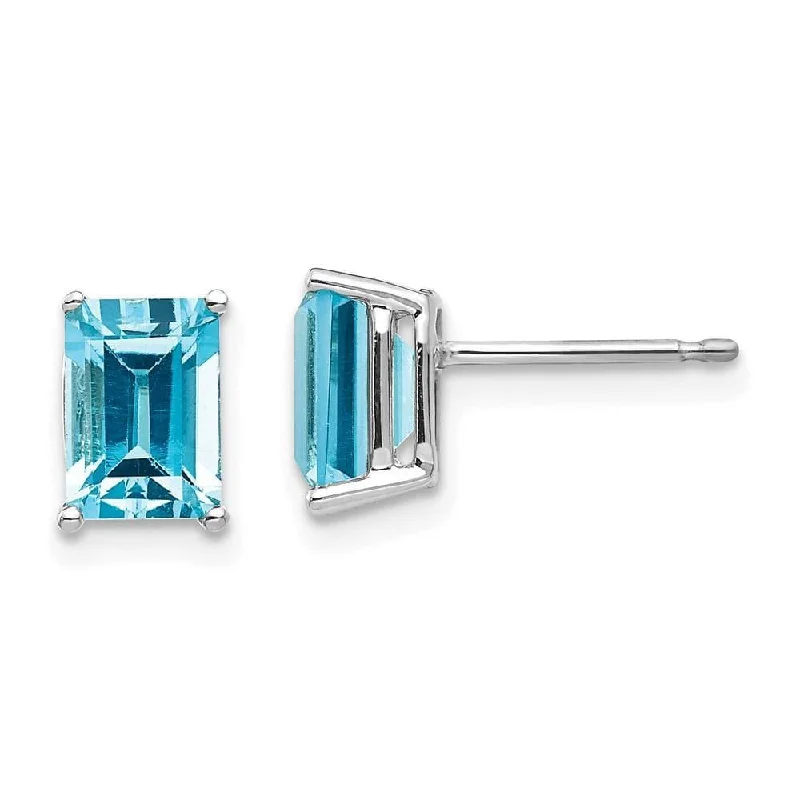 Orbit phase earrings-14k White Gold 7x5mm Emerald Cut Blue Topaz Earrings