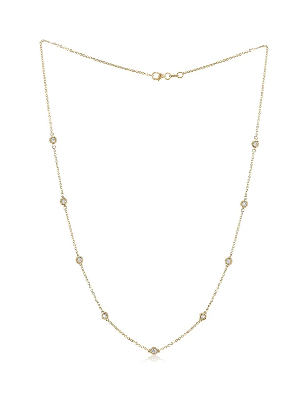 Pebble glass necklaces-14 kt yellow gold, 18" diamonds-by-the-yard necklace featuring 1.00 cts tw round diamonds