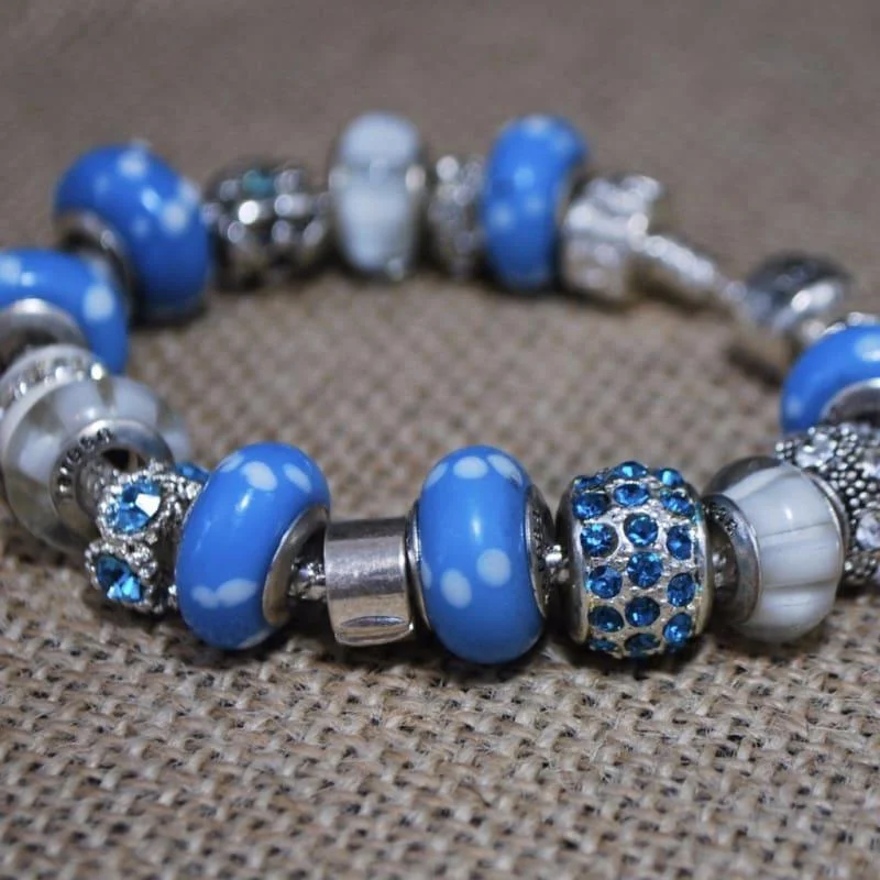 Cat motif bracelets-Blue and White Paw Prints Murano Glass Bead Charm Bracelets